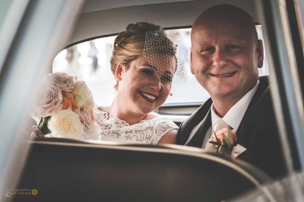 The bride reaches the location with her father