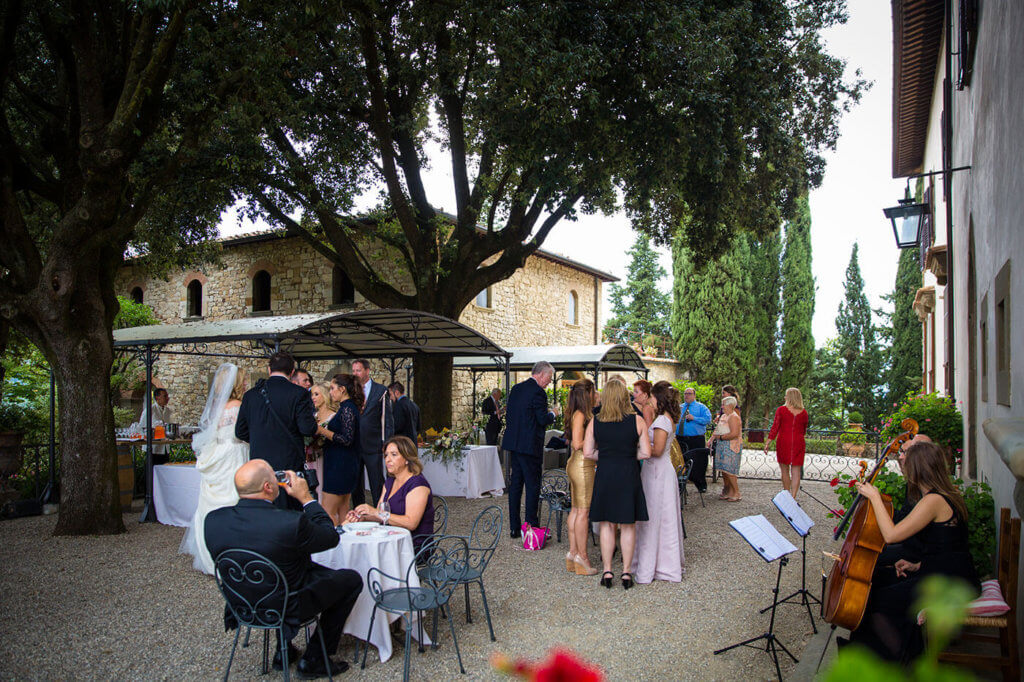 guests await the bride and groom to the reception