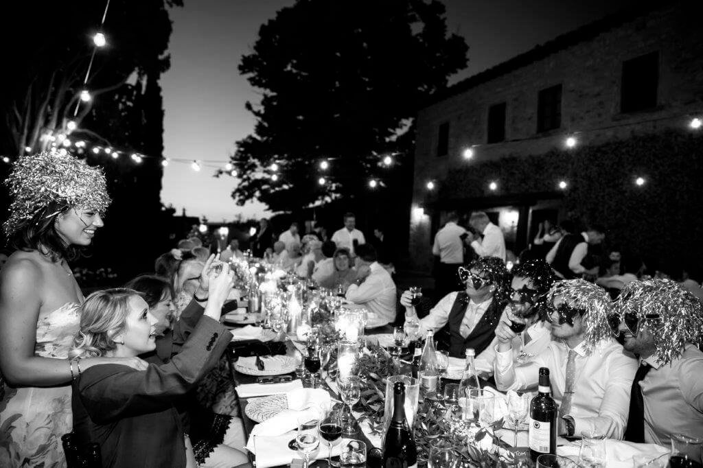 Guests and spouses enjoy dinner