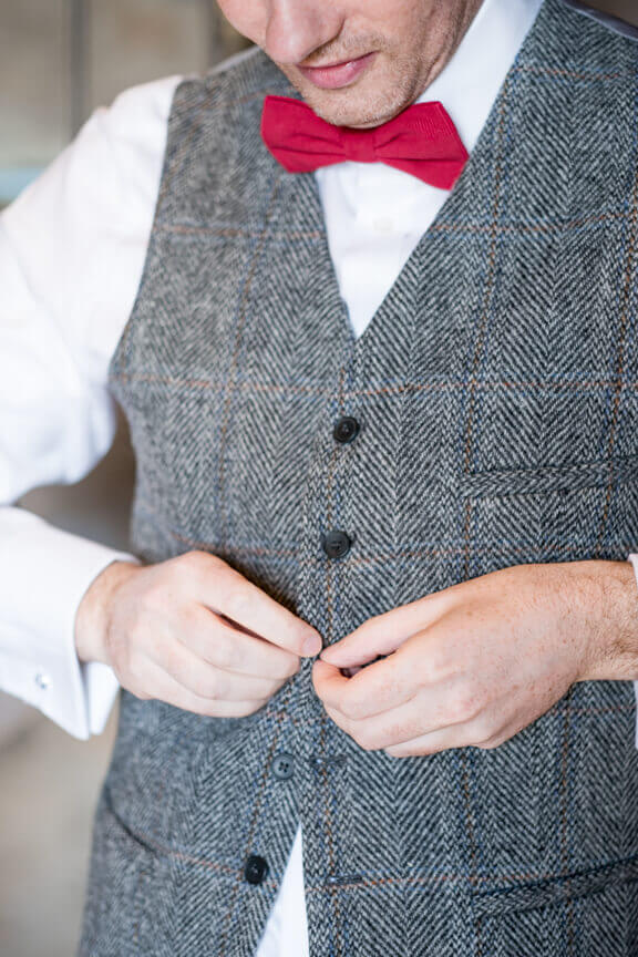 The groom prepares for the ceremony