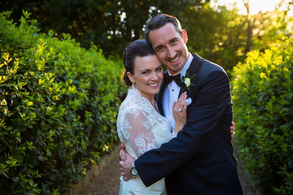 The newlyweds enjoy the garden of the Four Season Hotel