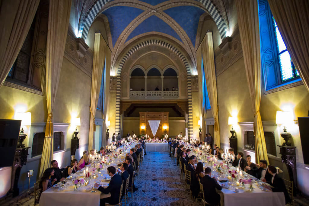 The newlyweds and their guests enjoy the wedding reception