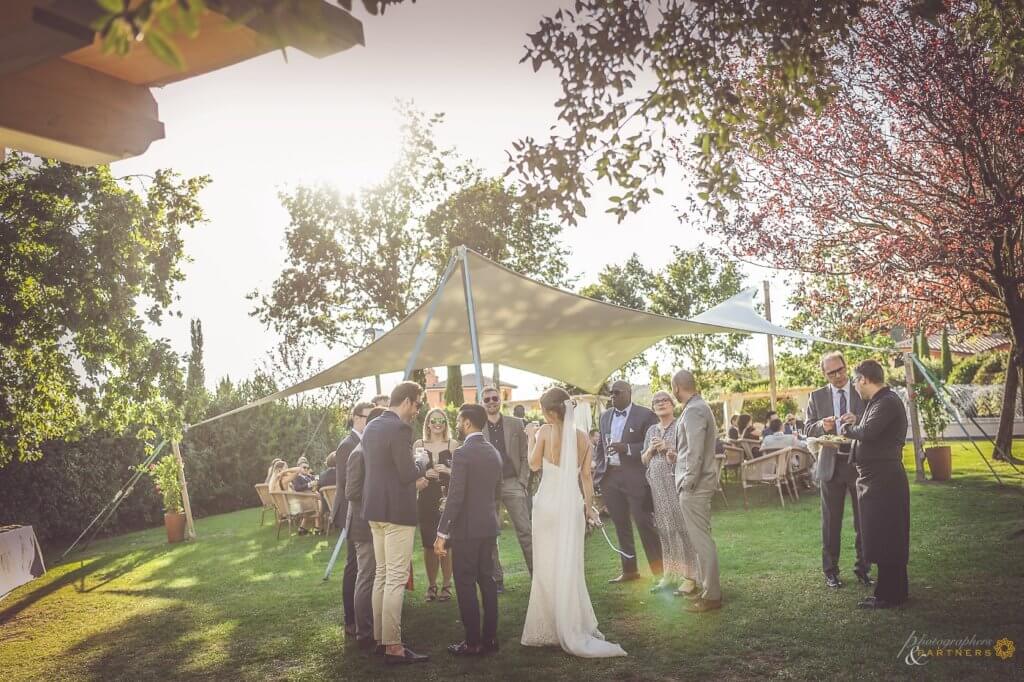 The newlyweds and guests enjoy the aperitif