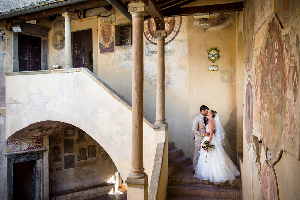 The newlyweds have a kiss in the palace ceremony