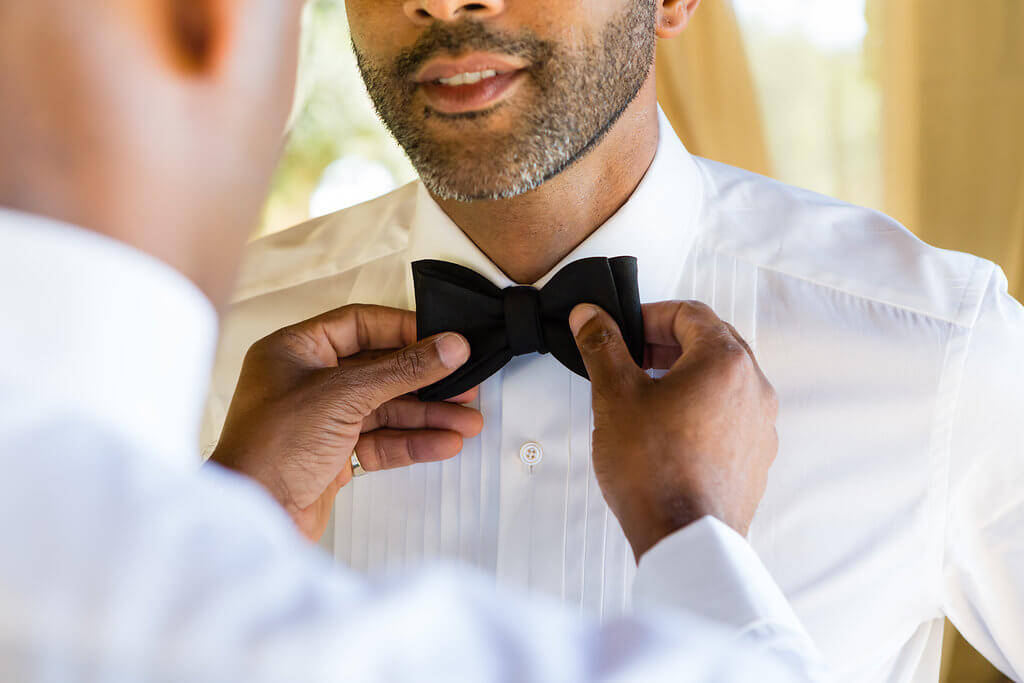 The groom prepares for the ceremony
