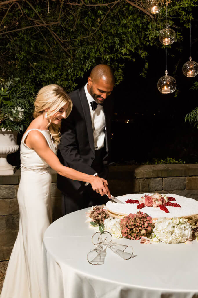 Bride and groom cut their wedding cake