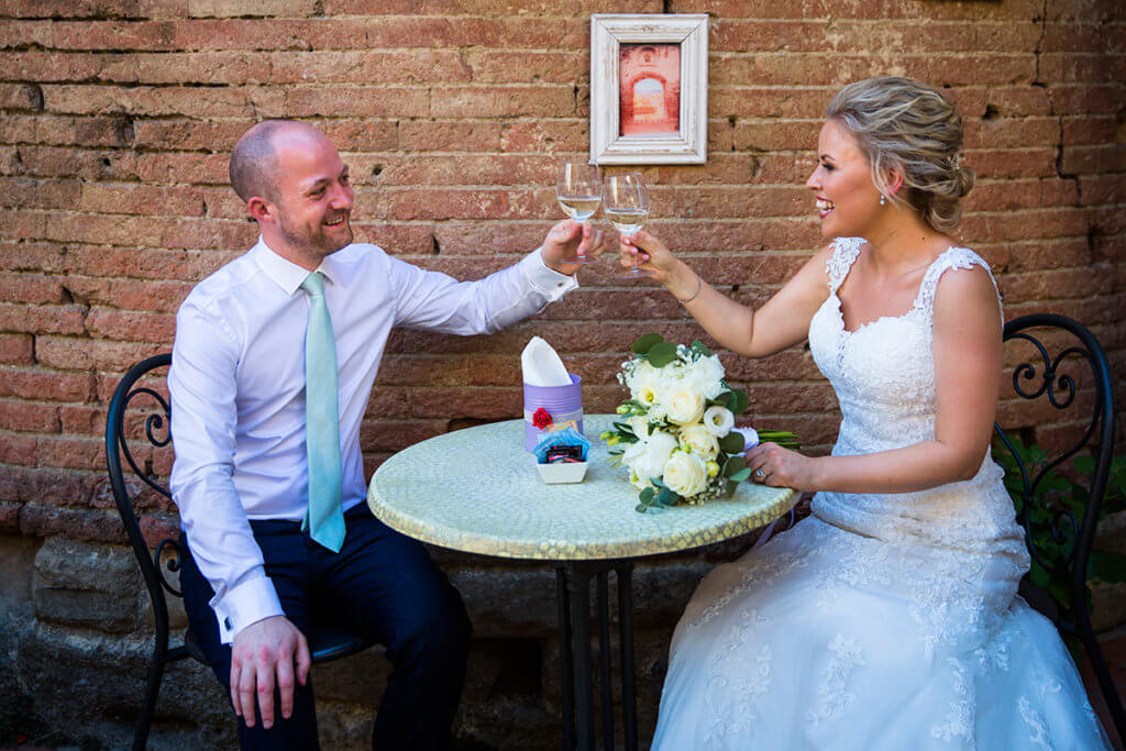 The newlyweds have a toast after the ceremony