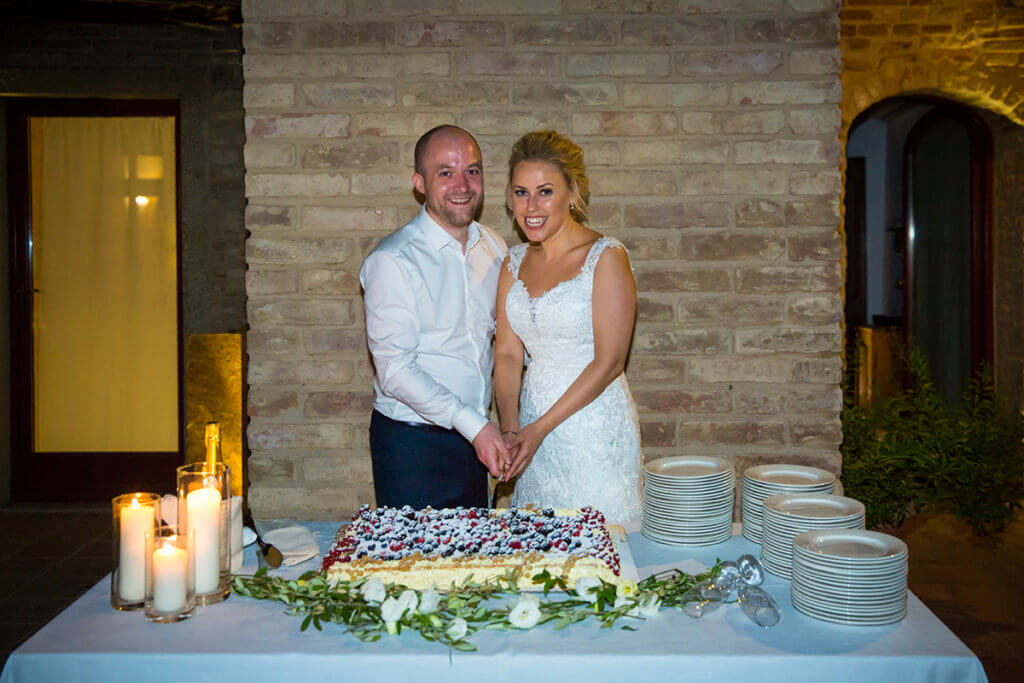 Bride and groom cut their wedding cake