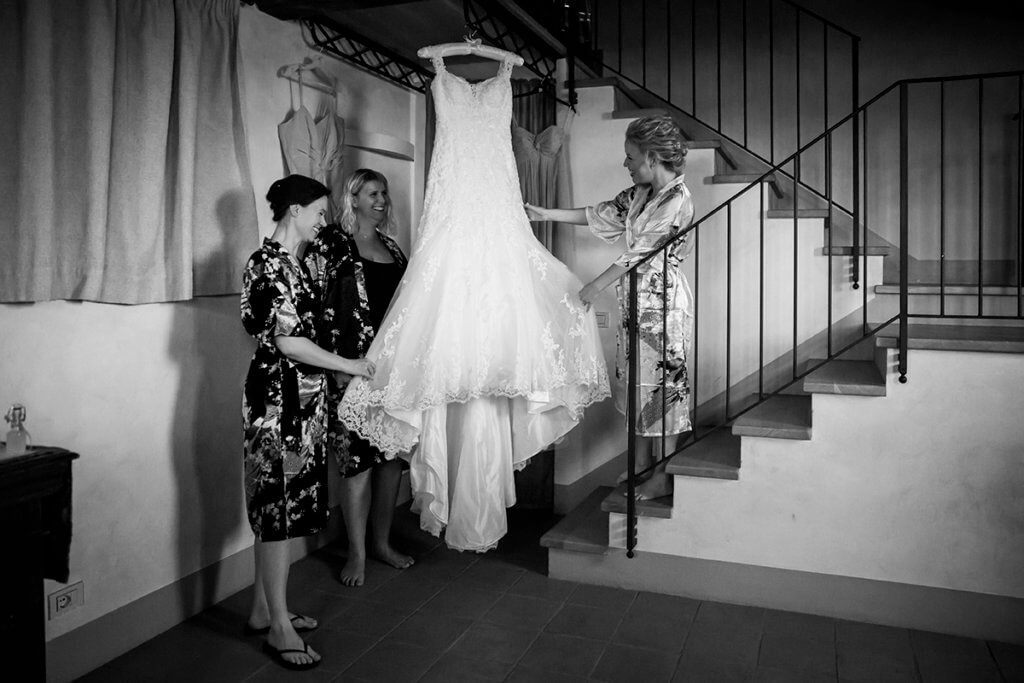 The bride prepares for the ceremony with her bridesmaids