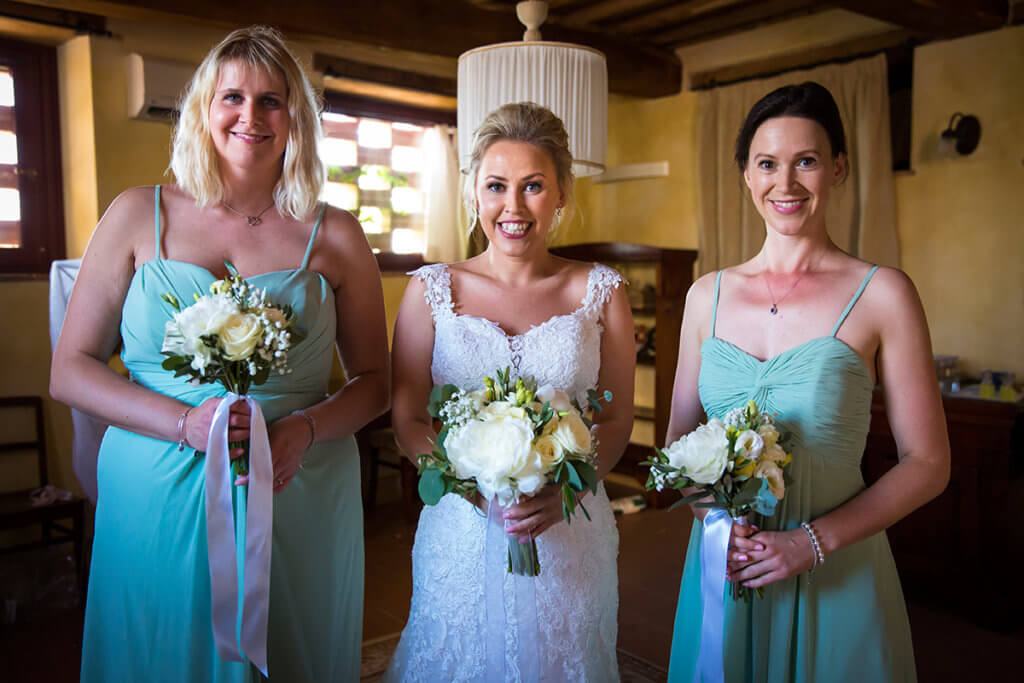 Bride and bridesmaid are ready for the ceremony