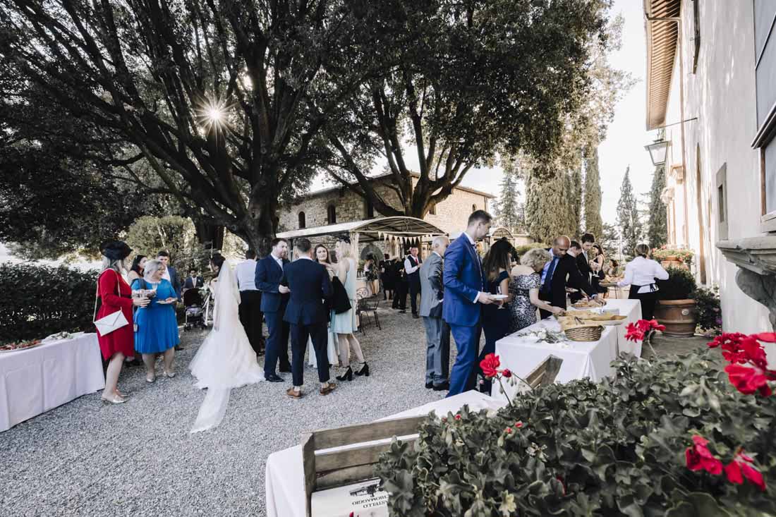 The newlyweds and guests enjoy the aperitif