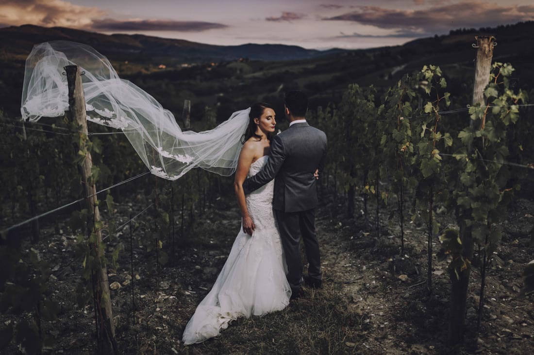 Jane & Aimun walk through the vineyard