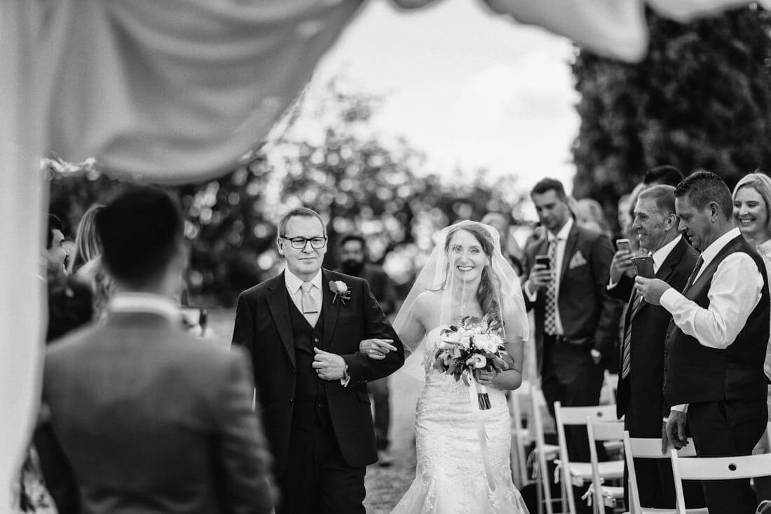 The bride arrives at the location of the ceremony