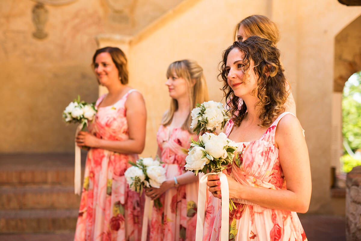 Bridesmaid listen to registrar speech during the ceremony