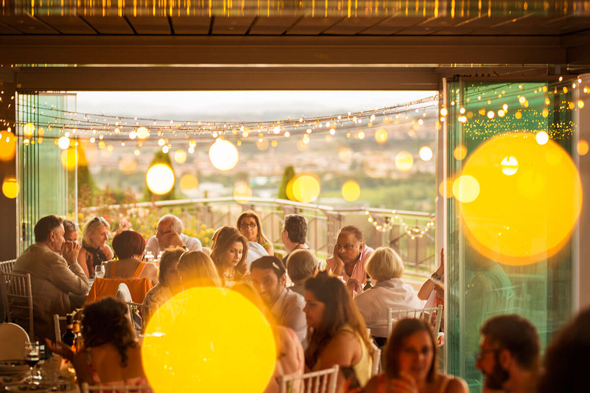 The newlyweds and their guests enjoy the wedding reception