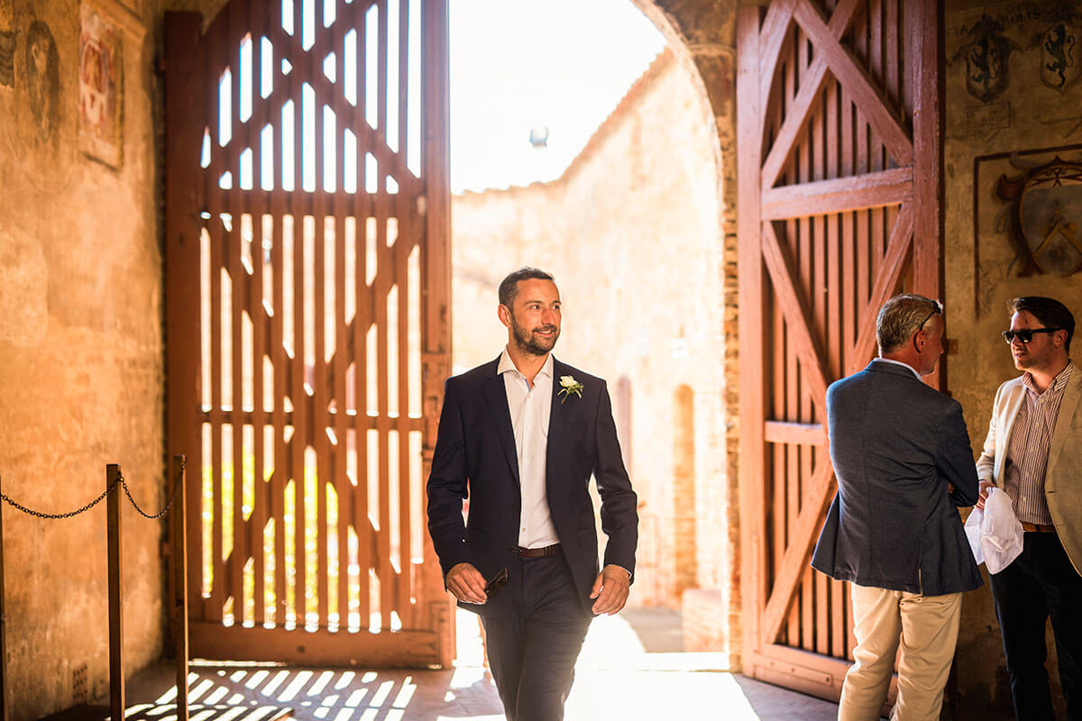 The groom arrives at the location of the ceremony