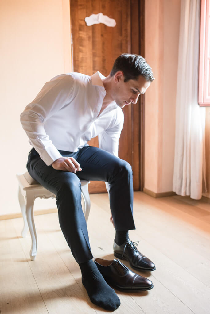 The groom prepares for the ceremony