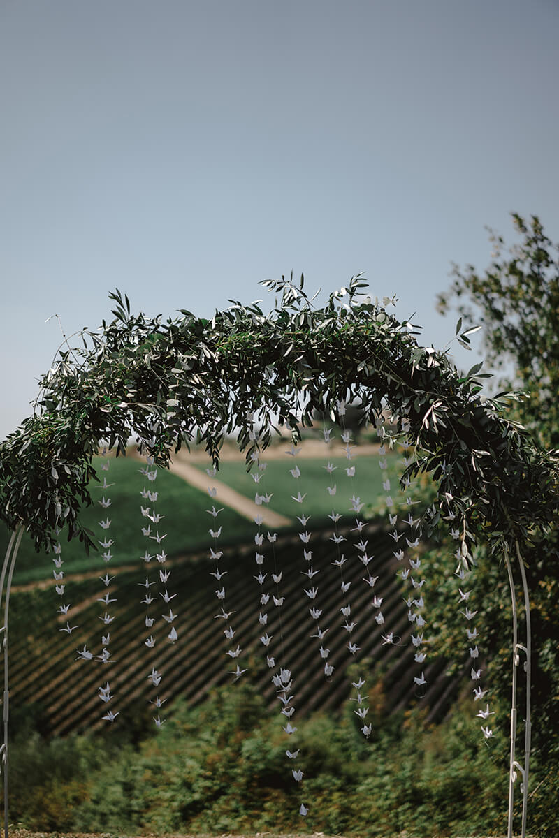 ceremony overlooking tuscan vineyards