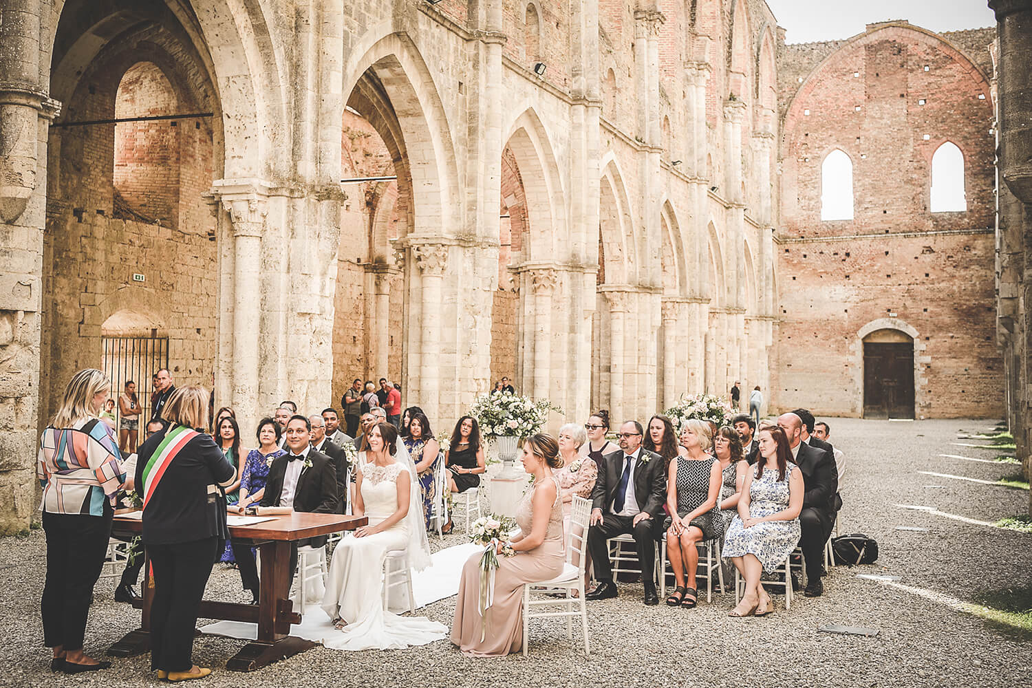 wedding ceremony in a old tuscan church 